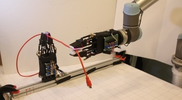Soft Gripper Robot Handles Cable